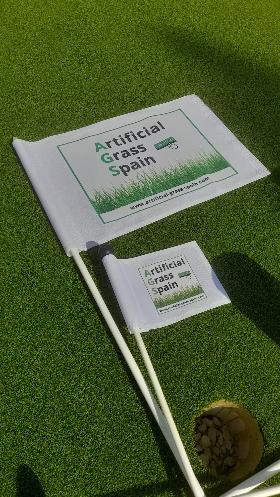 Branded flag on home putting green artificial grass Costa Blanca