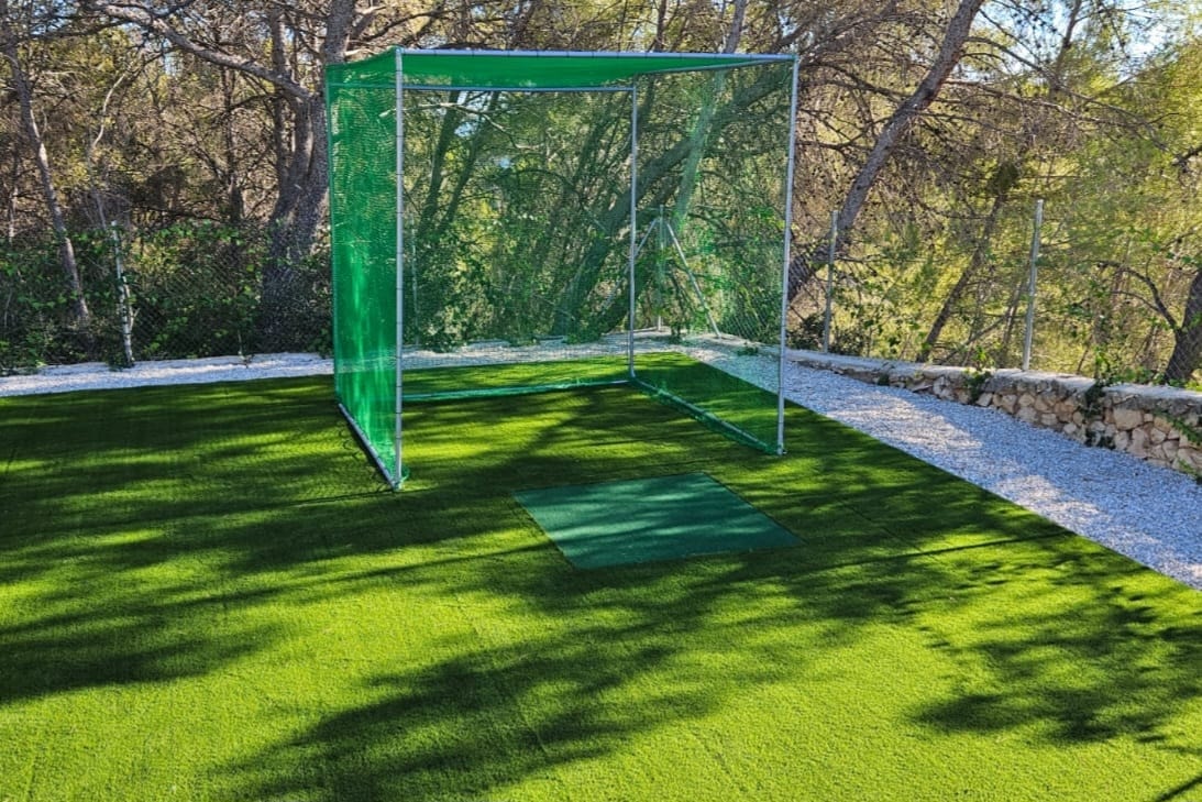 Backyard putting green with flags artificial grass Spain