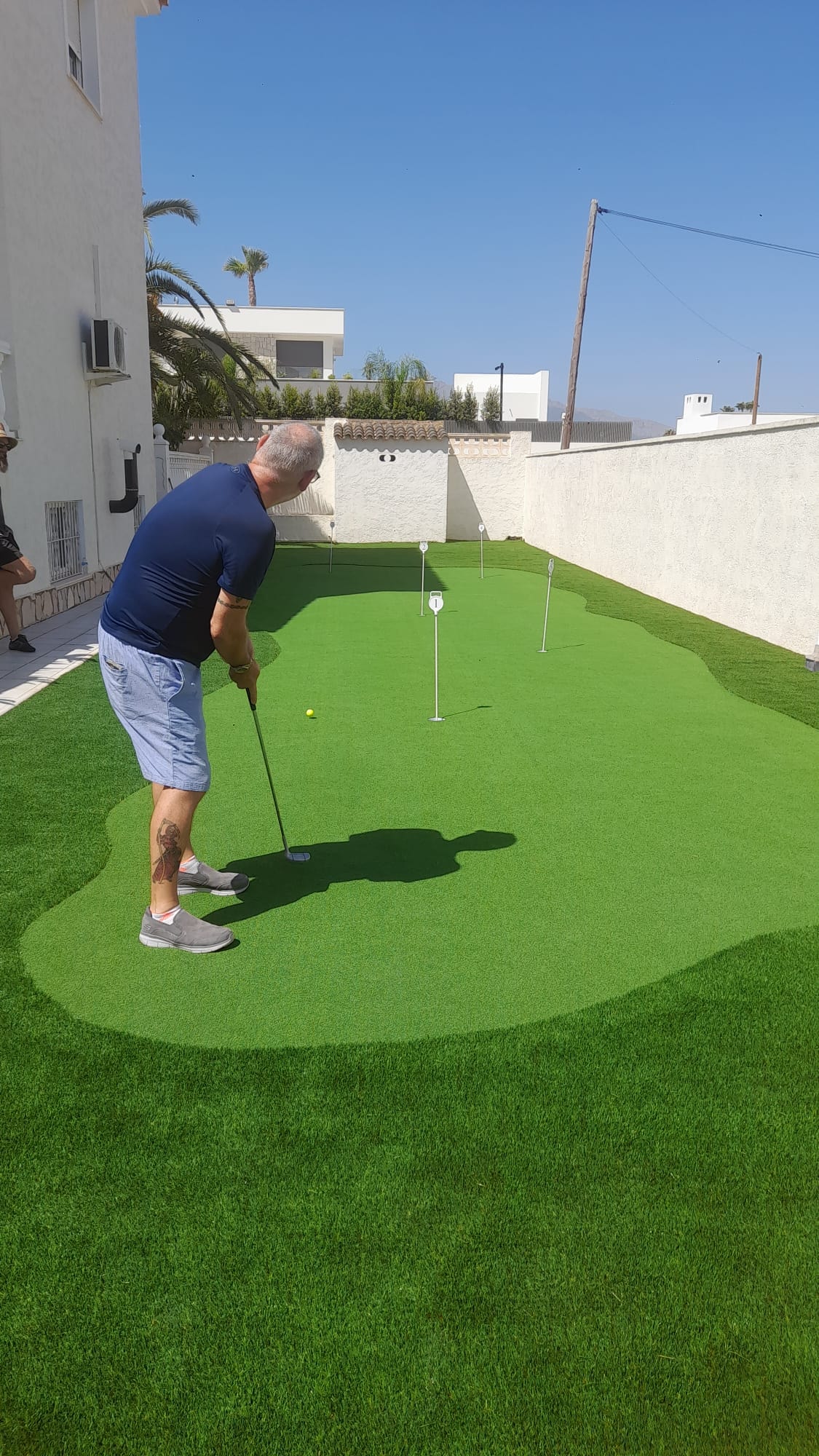 Home golf hitting bay artificial grass Spain