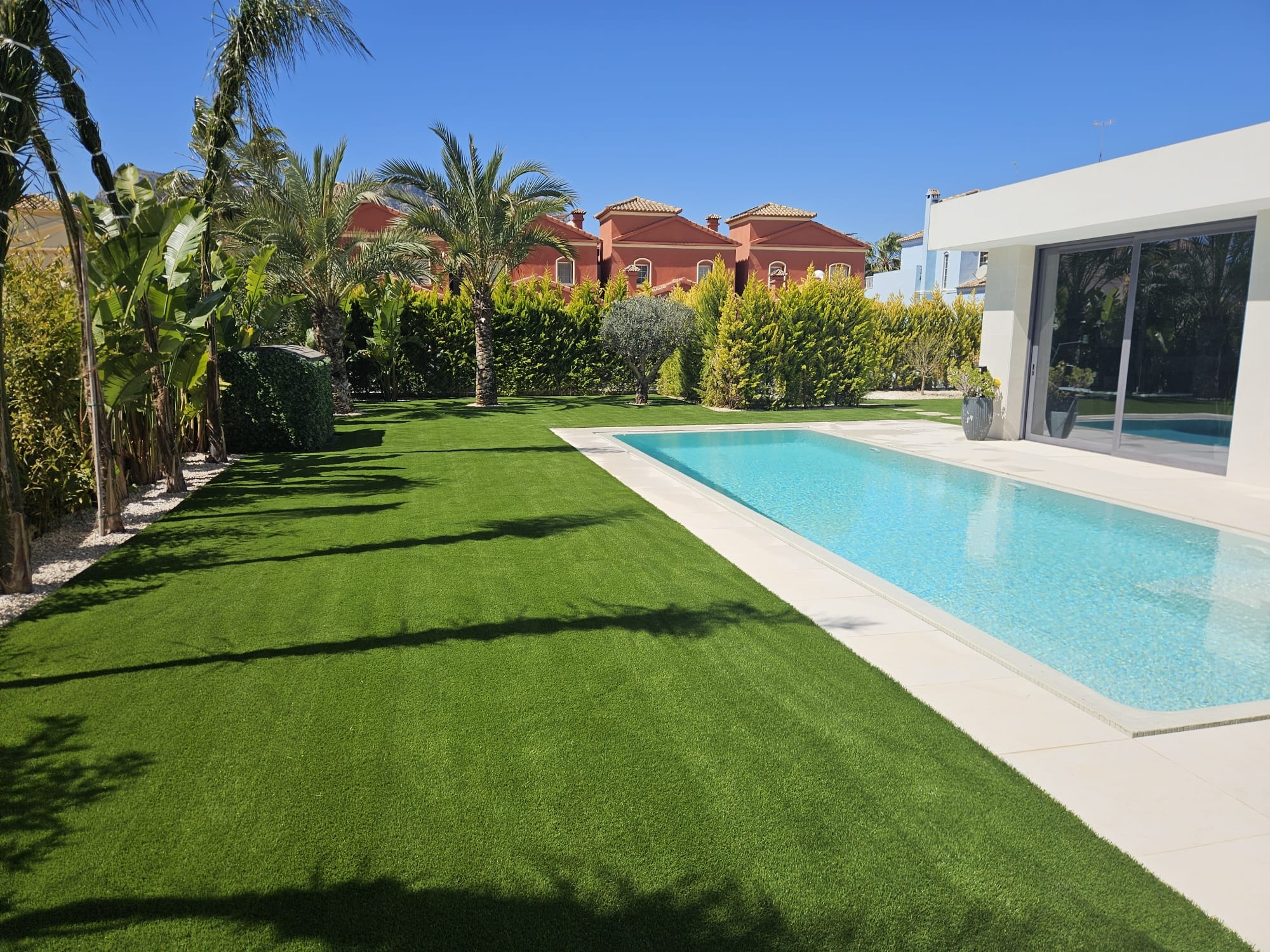 Artificial grass swimming pool surround luxury villa Costa Blanca